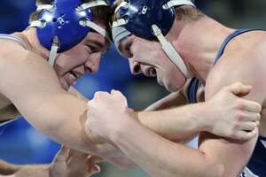 Image for National Kiss a Wrestler Day
